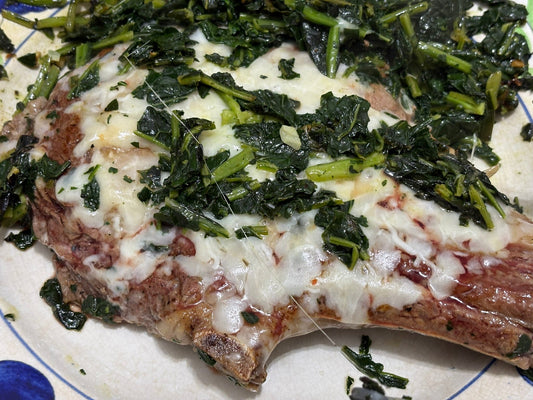 Bone-In Rib-Eye with Garlic Butter Kale